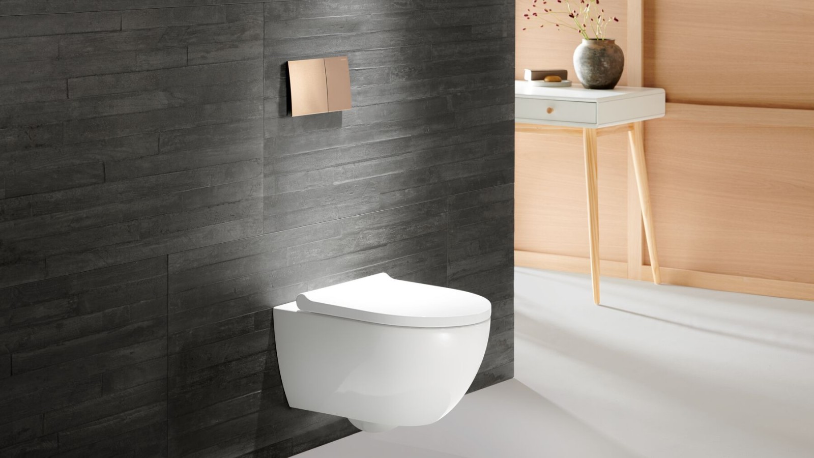 WC puodas Geberit Acanto su rožinio aukso spalvos vandens nuleidimo mygtuku Geberit Sigma70 WC puodas Geberit Acanto su rožinio aukso spalvos vandens nuleidimo mygtuku Geberit Sigma70