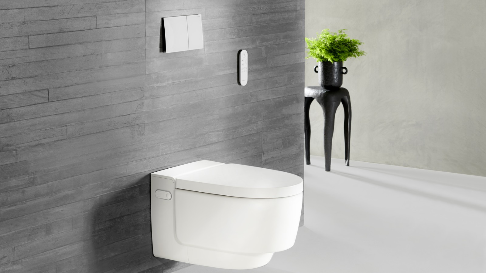 Geberit AquaClean Mera WC puodas ir Sigma70 vandens nuleidimo mygtukas (© Geberit)