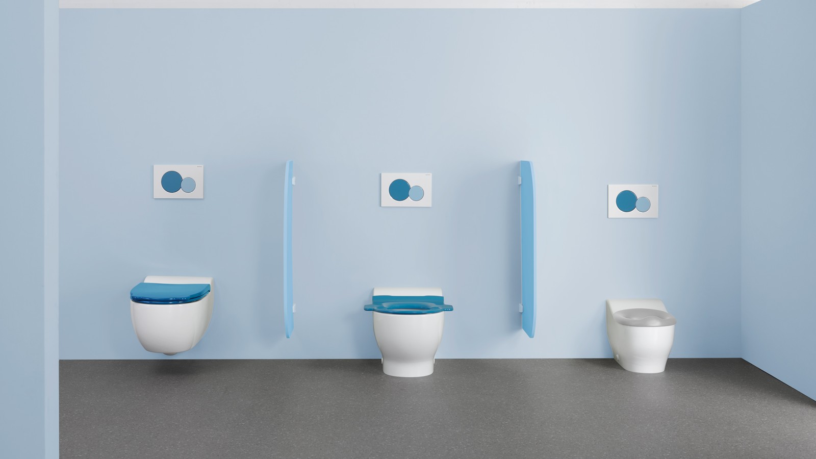WC puodai iš vonios kambario serijos Geberit Bambini su spalvingais WC puodų dangčiais ir vandens nuleidimo mygtukais WC puodai iš vonios kambario serijos Geberit Bambini su spalvingais WC puodų dangčiais ir vandens nuleidimo mygtukais