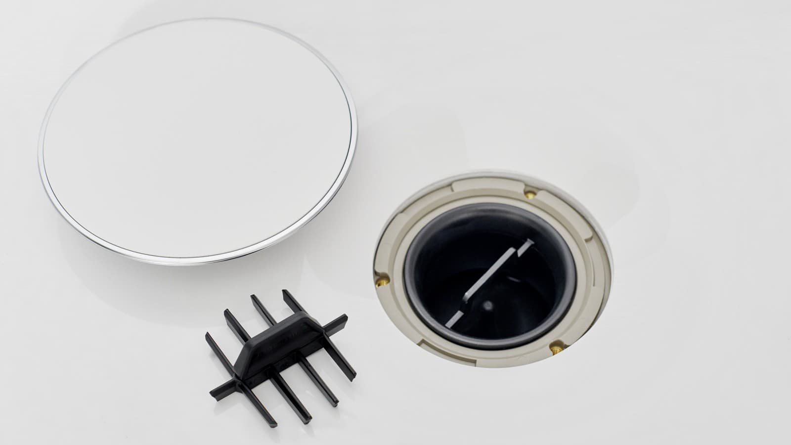 Sifono dangtelis ir dantytasis nuosėdų šalinimo įdėklas Sifono dangtelis ir dantytasis nuosėdų šalinimo įdėklas