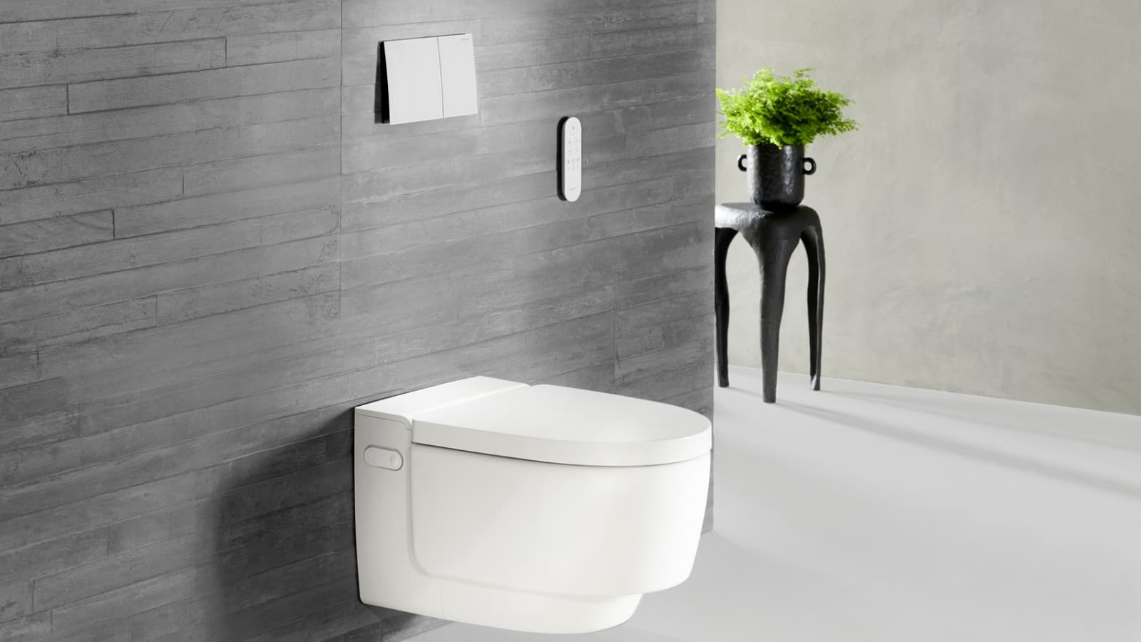Geberit AquaClean Mera WC puodas ir Sigma70 vandens nuleidimo mygtukas (© Geberit) Geberit AquaClean Mera WC puodas ir Sigma70 vandens nuleidimo mygtukas (© Geberit)